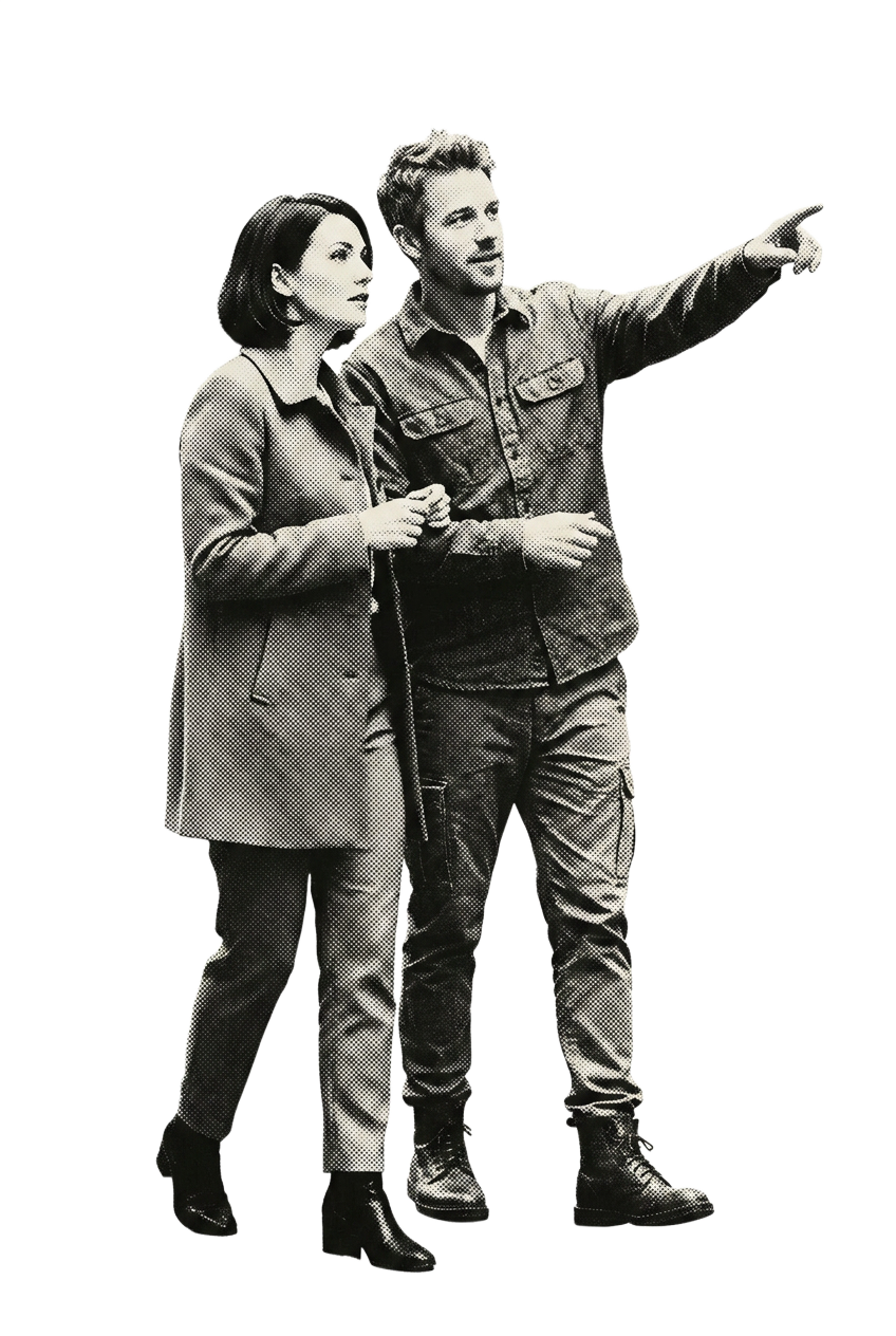 A couple pointing at something across a gallery